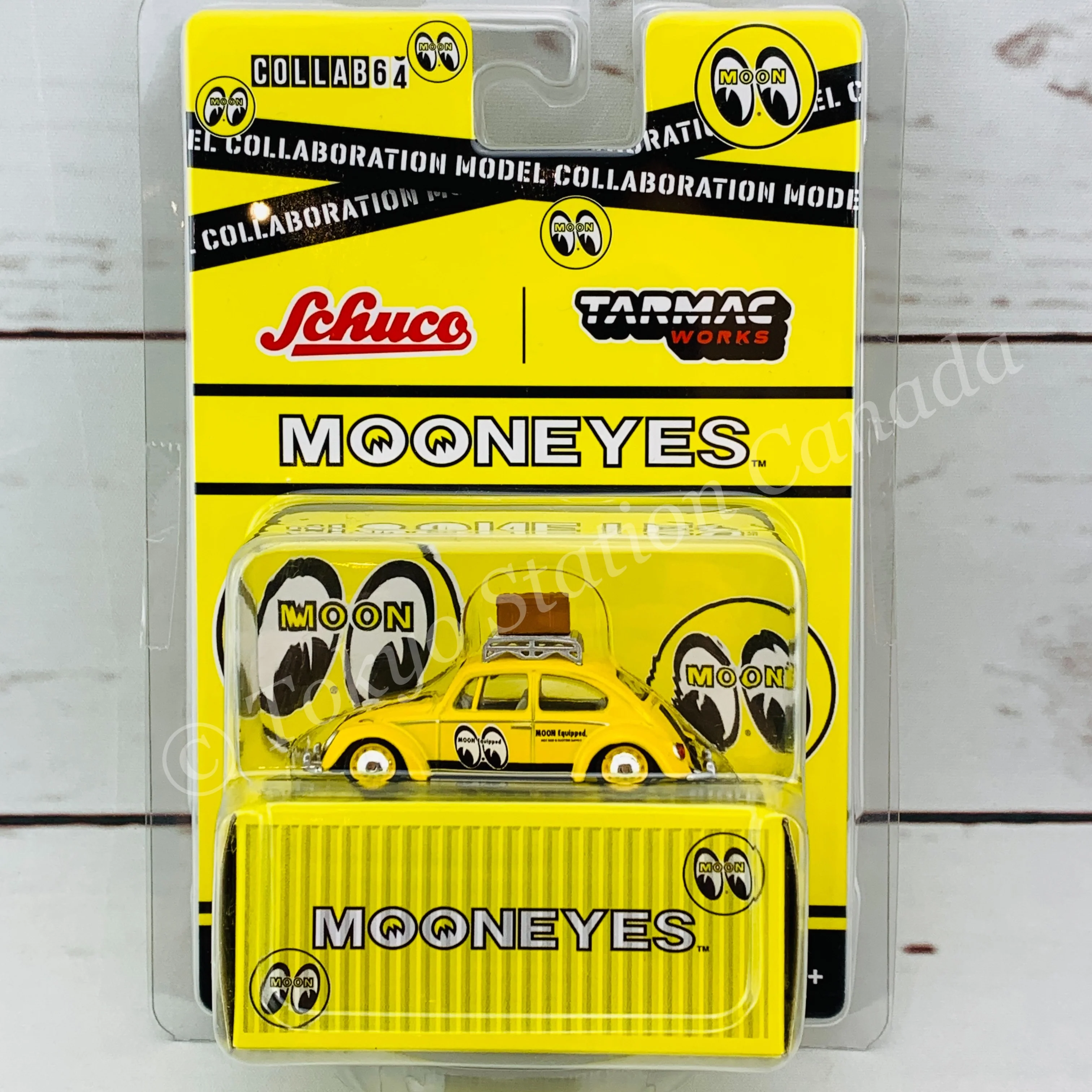 Tarmac Works x Schuco COLLAB64 1/64 Volkswagen Beetle Mooneyes with roof rack and suitcases T64S-006-ME1 - Image 2