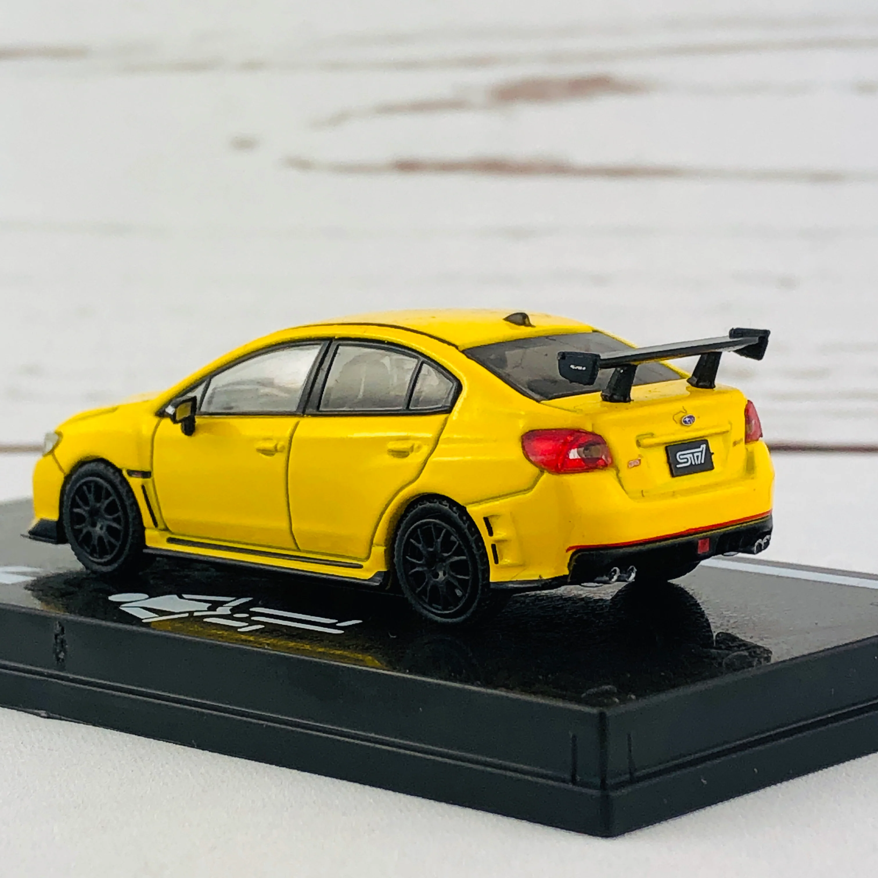 Tarmac Works 1/64 Subaru WRX STI S207 NBR Package Sunrise Yellow - Image 4