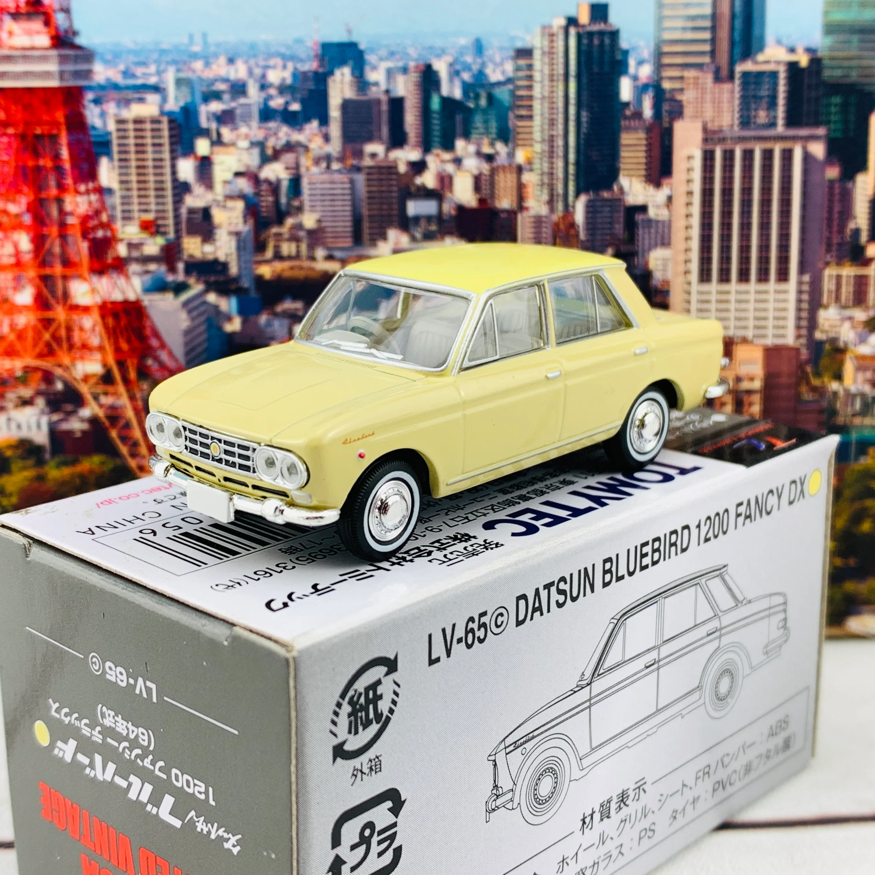Tomica Limited Vintage 1/64 Datsun Bluebird 1200 Fancy DX Yellow LV-65c - Image 2