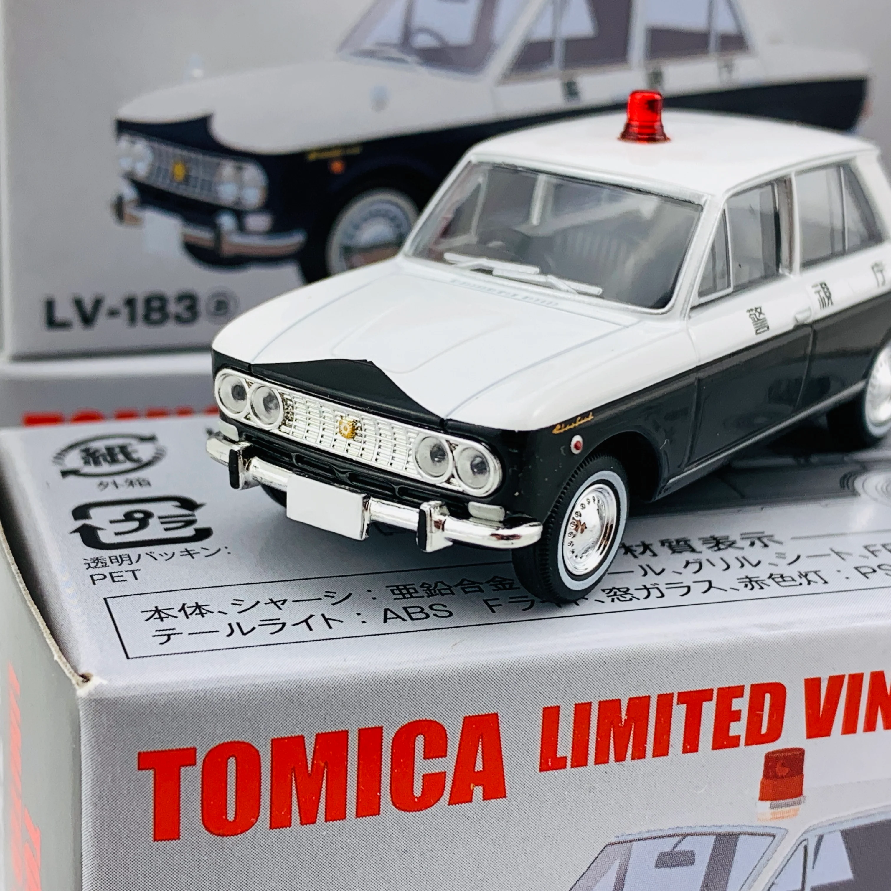 Tomica Limited Vintage 1/64 Datsun Bluebird Patrol Car (1965) LV-183a - Image 2