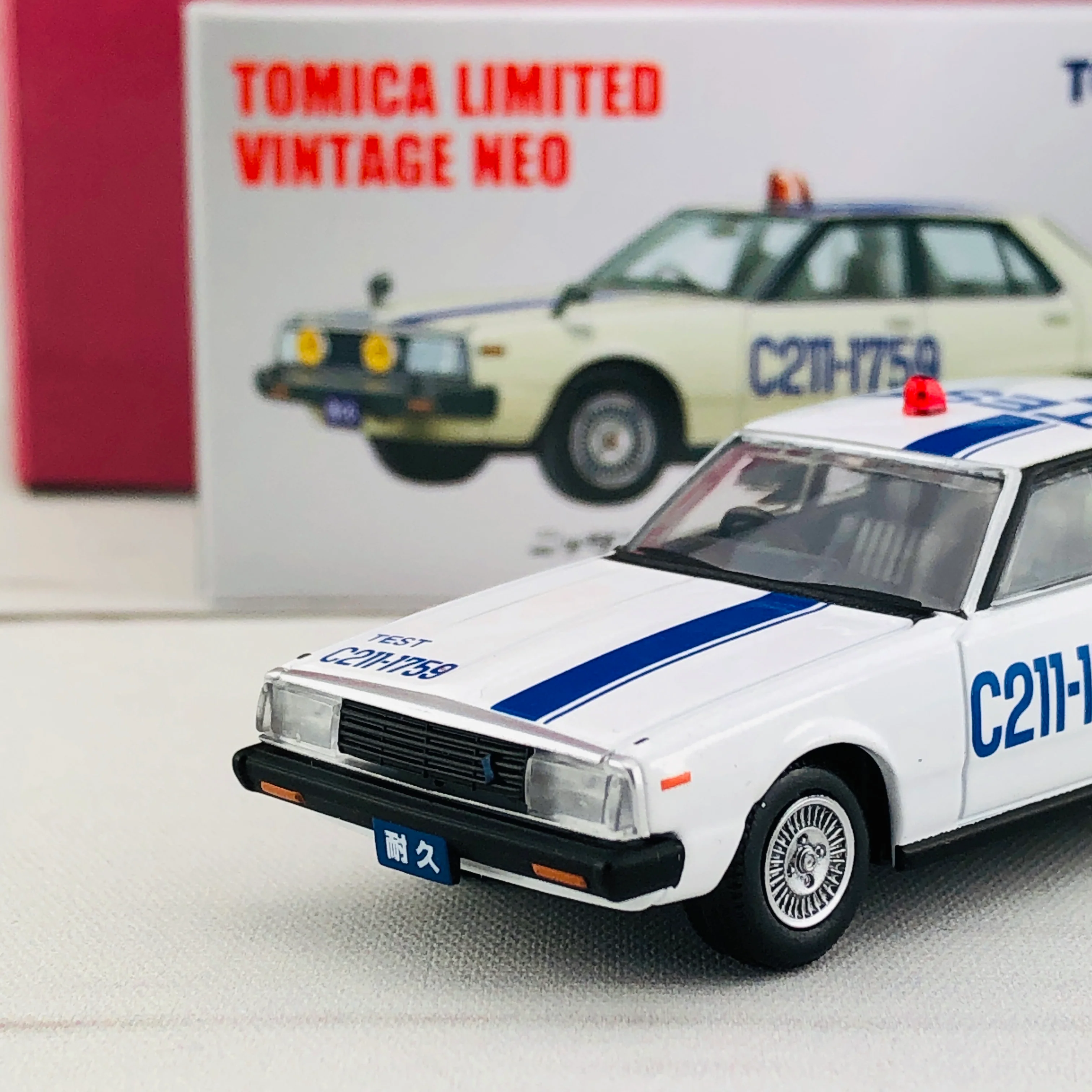 Tomica Limited Vintage 1/64 Nissan Skyline 2000 Turbo GT-E.S TEST CAR (1980) OGIKUBO-DAMASHII Vol.4 - Image 3