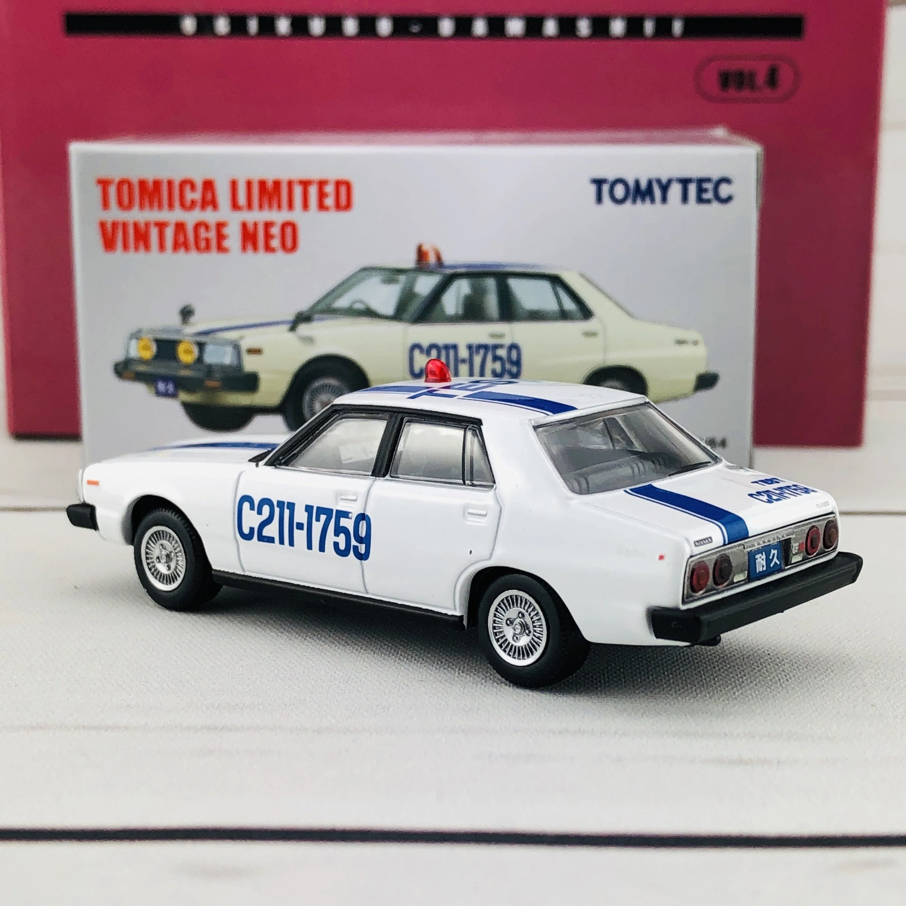Tomica Limited Vintage 1/64 Nissan Skyline 2000 Turbo GT-E.S TEST CAR (1980) OGIKUBO-DAMASHII Vol.4 - Image 4