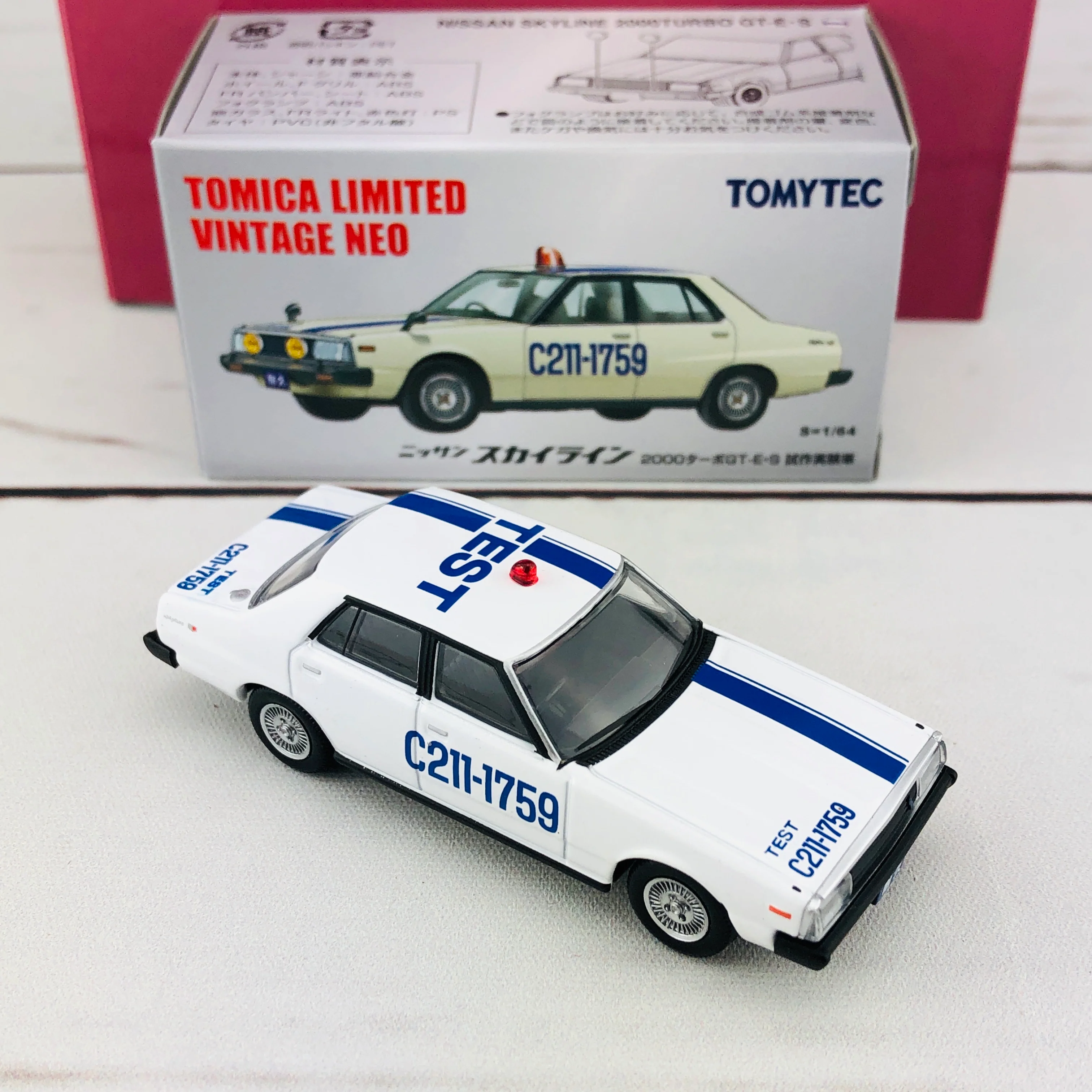 Tomica Limited Vintage 1/64 Nissan Skyline 2000 Turbo GT-E.S TEST CAR (1980) OGIKUBO-DAMASHII Vol.4 - Image 6