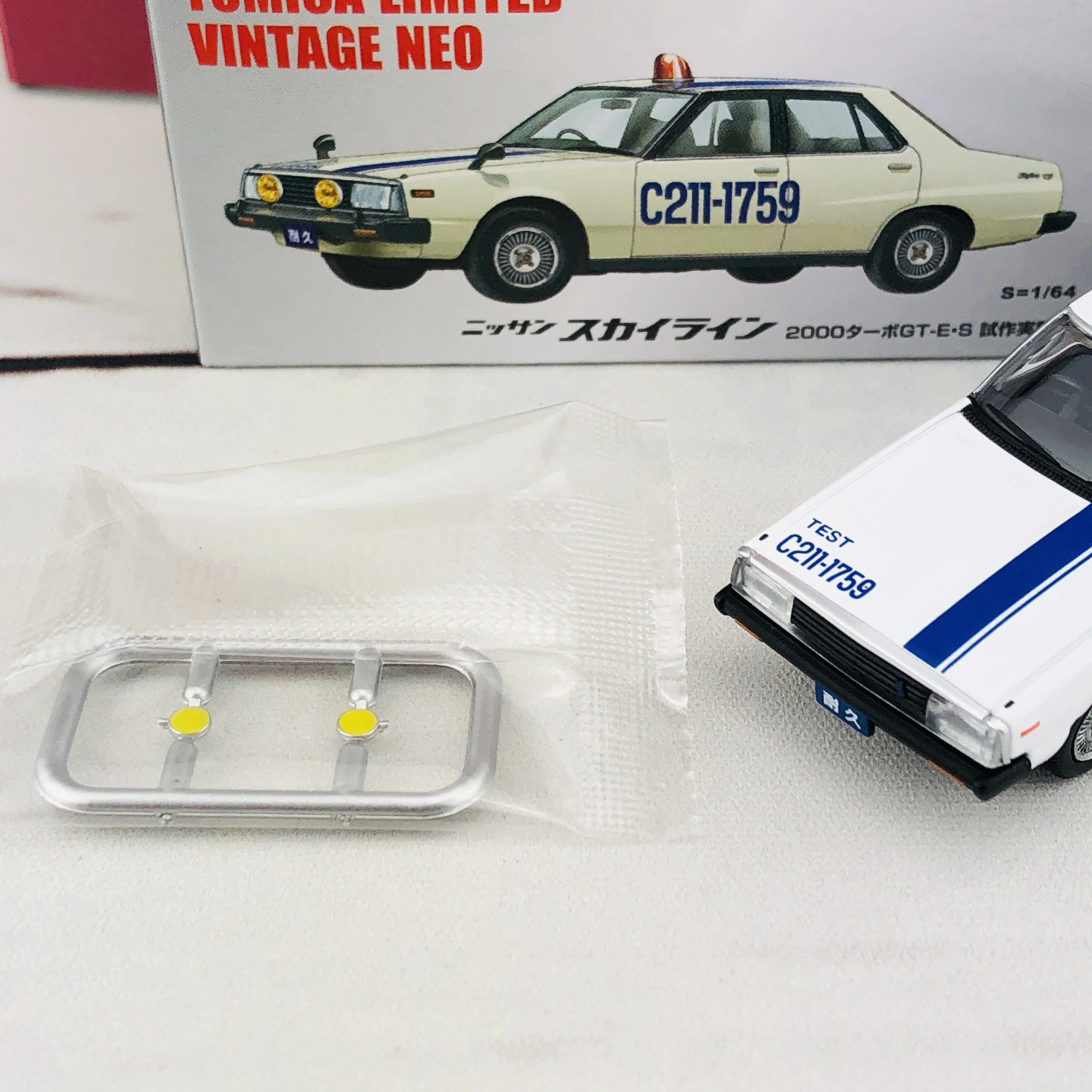 Tomica Limited Vintage 1/64 Nissan Skyline 2000 Turbo GT-E.S TEST CAR (1980) OGIKUBO-DAMASHII Vol.4 - Image 8