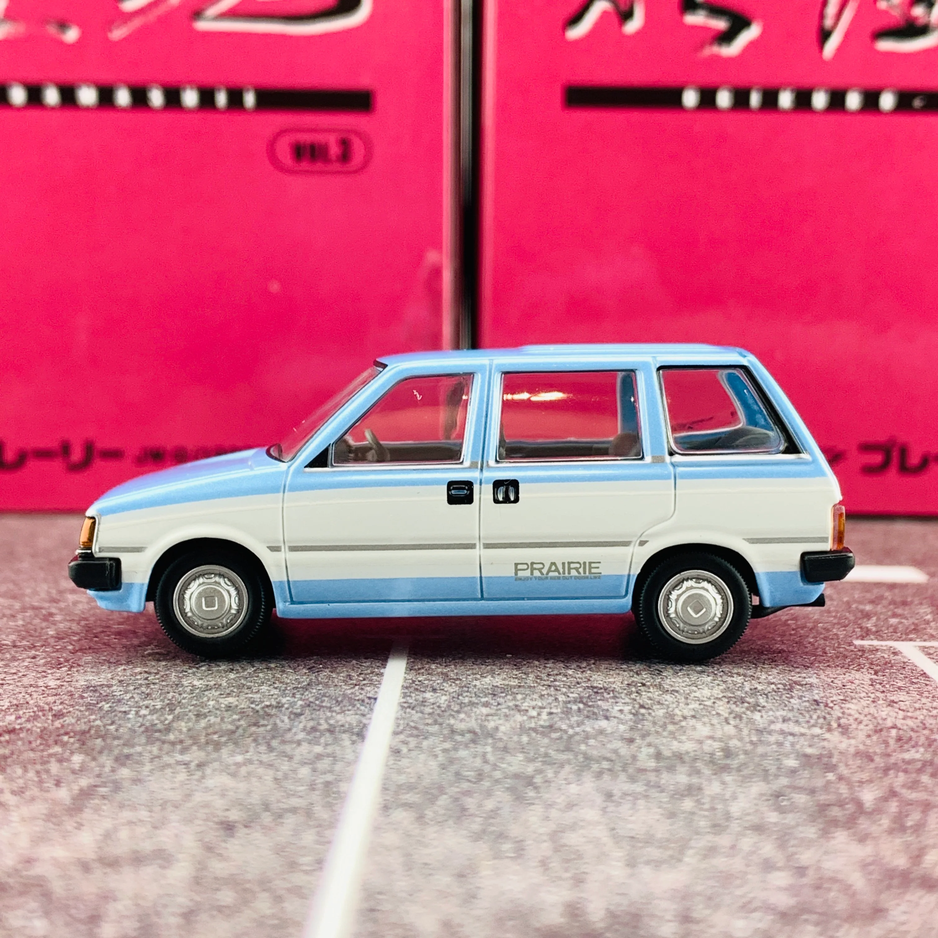 Tomica Limited Vintage Neo 1/64 Ogikubo Damasii Nissan Prairie JW-G (Year 1982) - Image 3