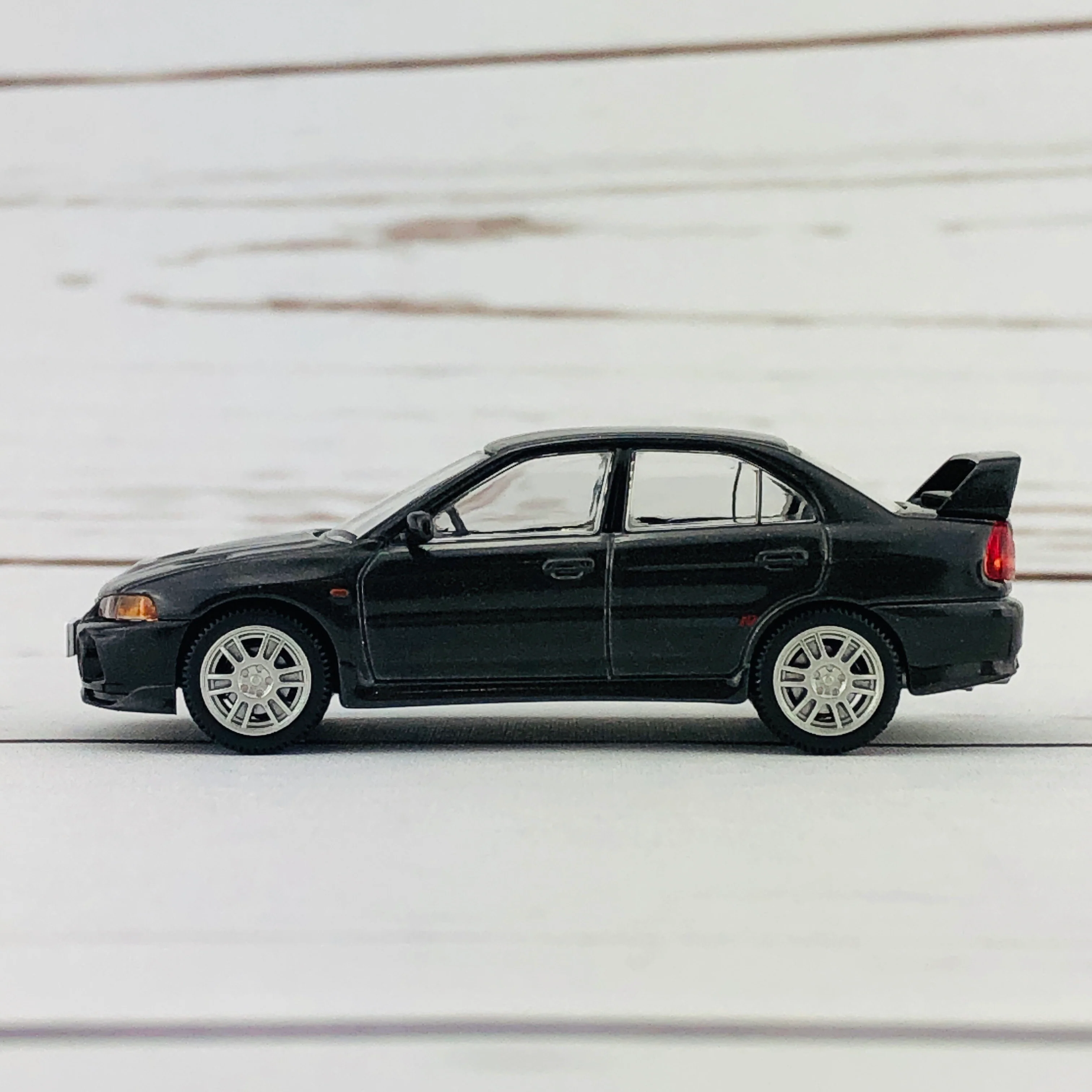 Tomica Limited Vintage Neo Mitsubishi Lancer Evolution IV GSR Black (1996) LV-N186b - Image 2