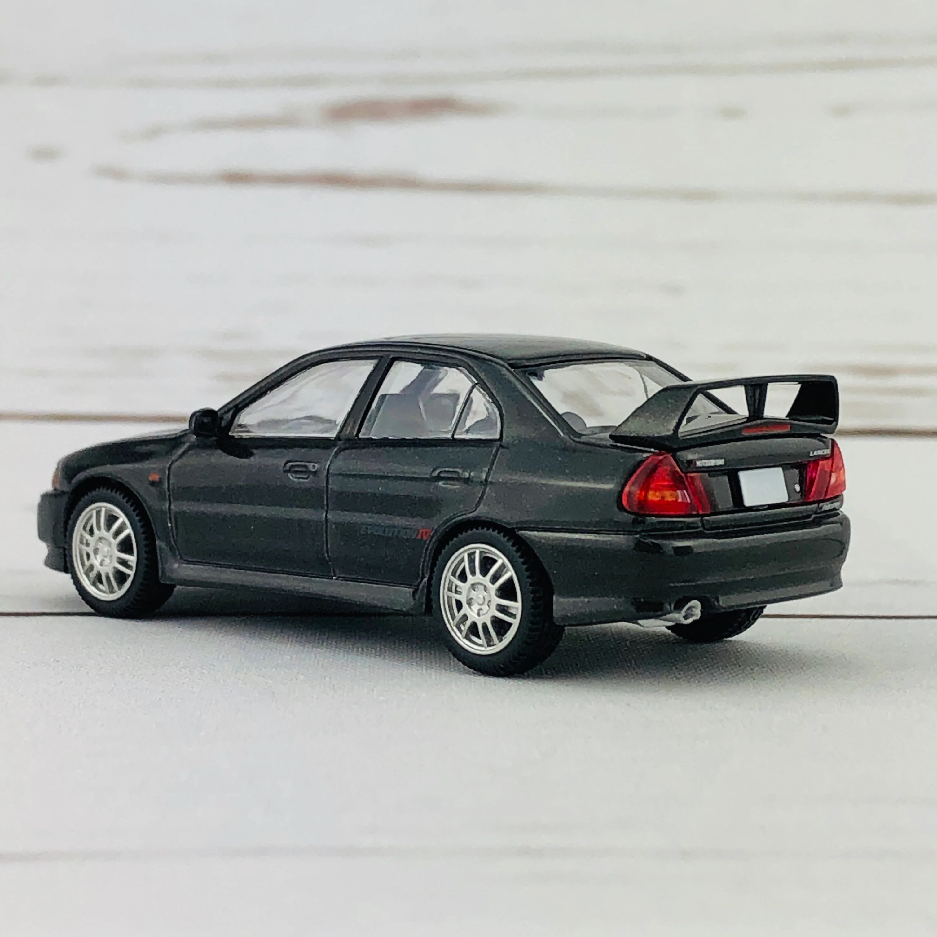 Tomica Limited Vintage Neo Mitsubishi Lancer Evolution IV GSR Black (1996) LV-N186b - Image 6