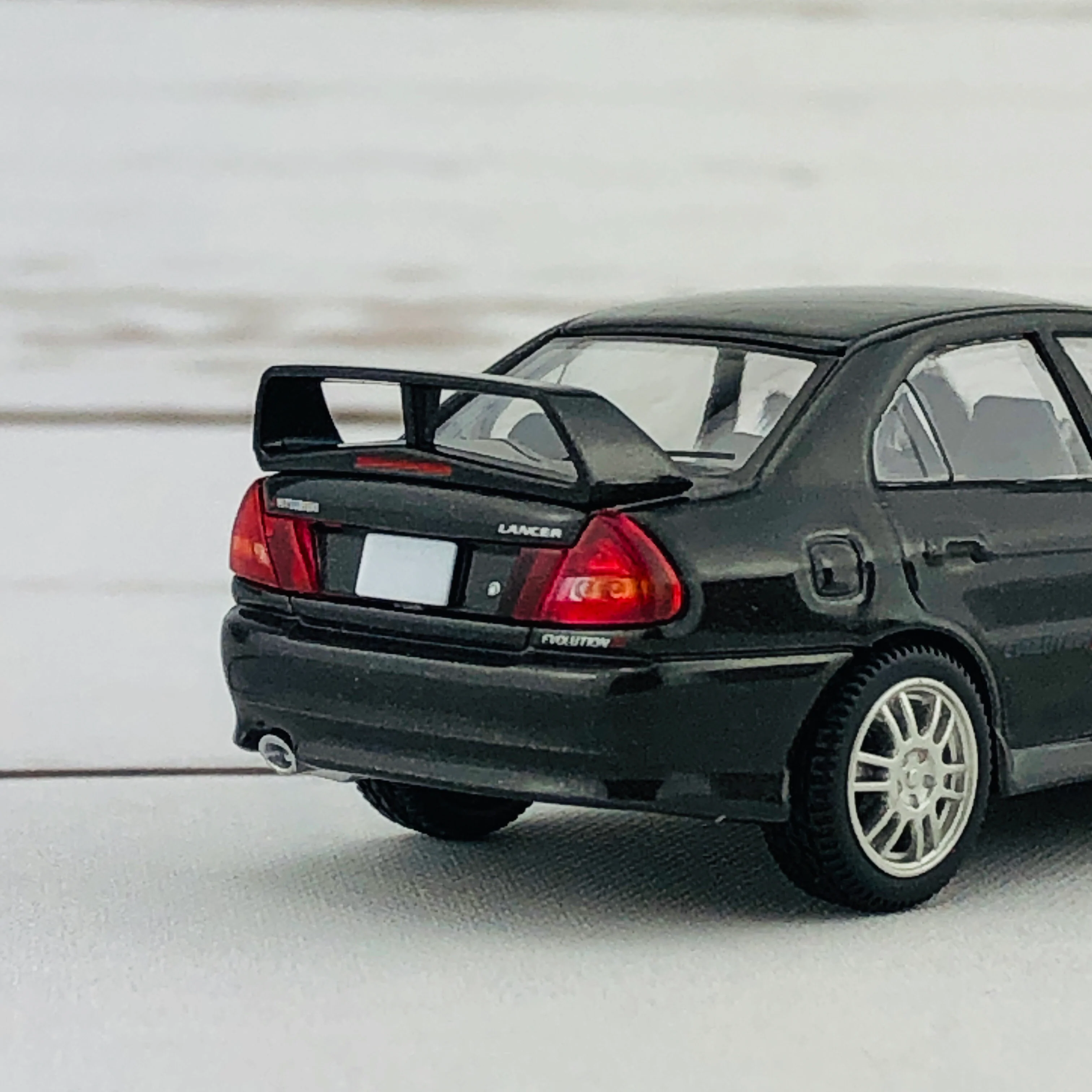 Tomica Limited Vintage Neo Mitsubishi Lancer Evolution IV GSR Black (1996) LV-N186b - Image 7