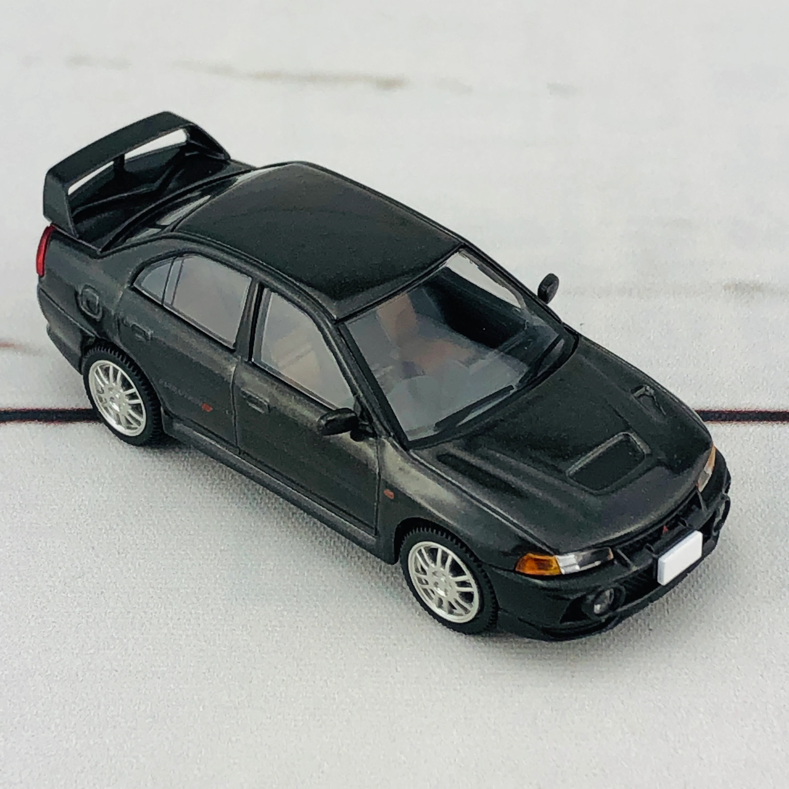 Tomica Limited Vintage Neo Mitsubishi Lancer Evolution IV GSR Black (1996) LV-N186b - Image 9