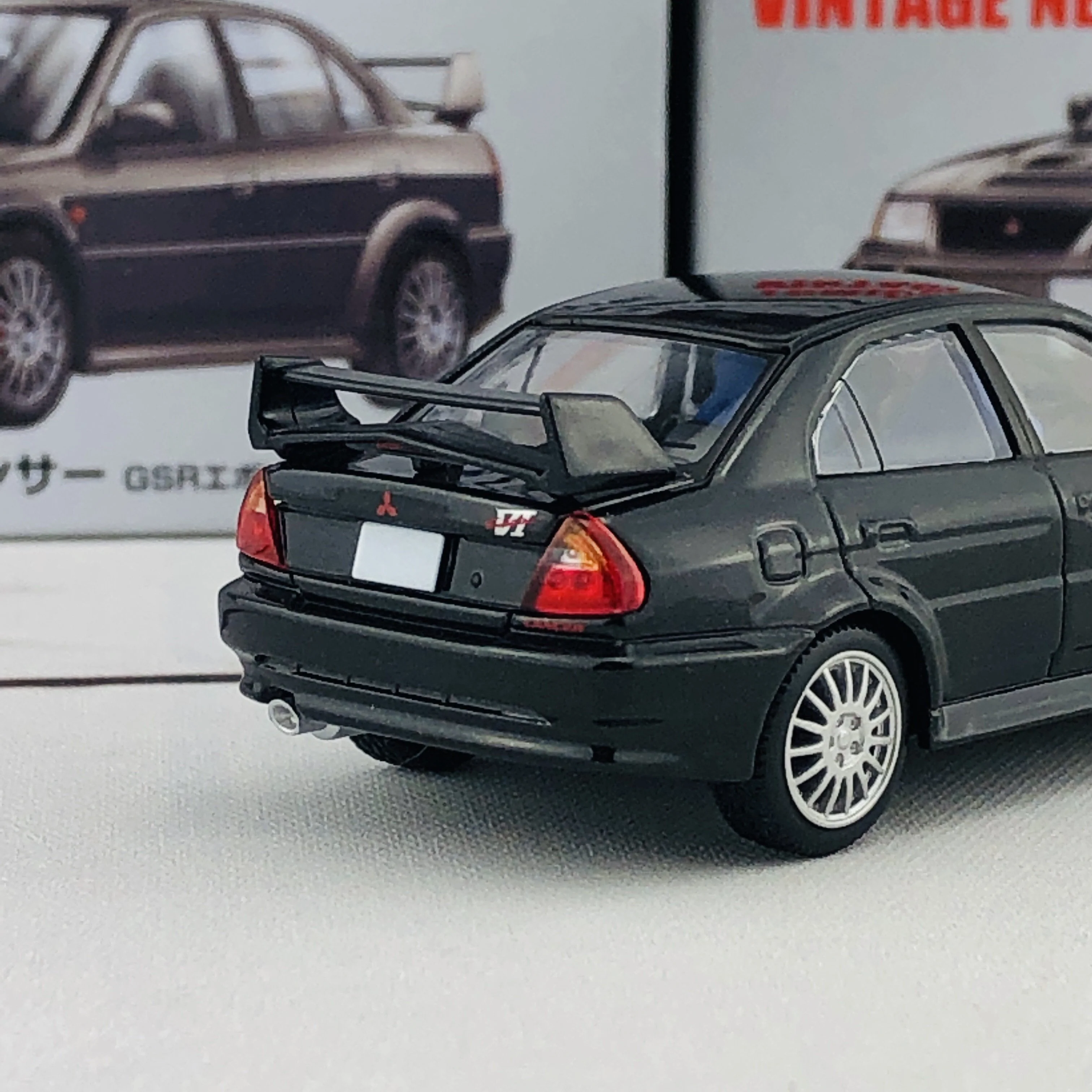 Tomica Limited Vintage Neo Mitsubishi Lancer Evolution VI GSR Black (1999) LV-N190b - Image 5