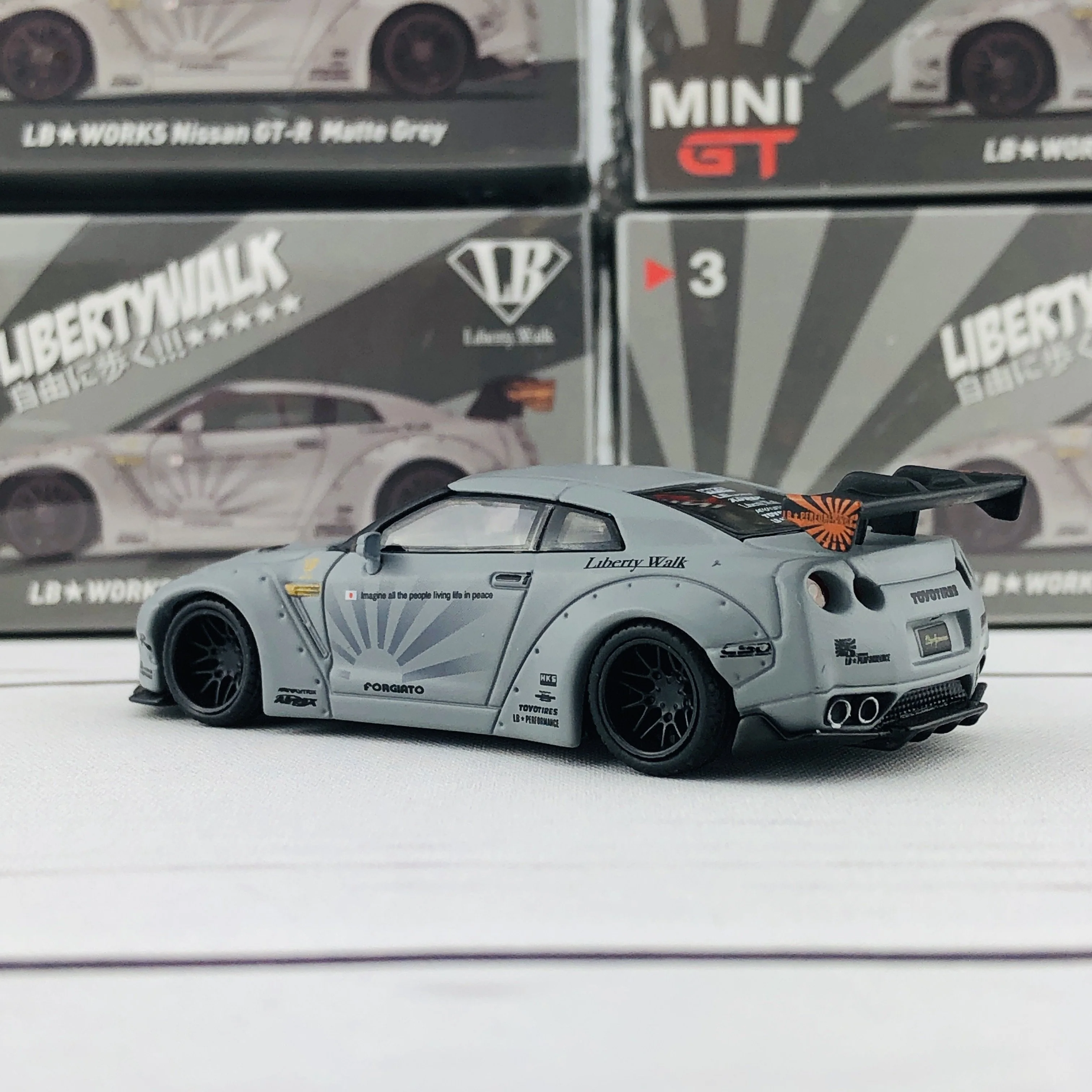 MINI GT 1/64 LIBERTYWALK LB★WORKS Nissan GTR (R35) Matte Grey - RHD MGT000003-R - Image 4